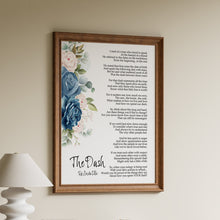 Load image into Gallery viewer, Framed print of 'The Dash' poem with floral design on a wall above a wooden shelf.