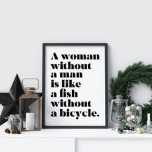 Load image into Gallery viewer, Feminist Wall Art "A woman without a man is like a fish without a bicycle.”