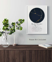 Load image into Gallery viewer, Kintsugi Definition wall art print with a gold and dark navy circle design on a white background. Shown here in a white frame, not included