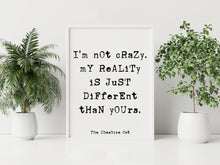 Load image into Gallery viewer, Cheshire Cat Quote Print – “I’m Not Crazy” Wall Art, Alice in Wonderland Decor, Book Nook Decor, Black and White Book Shelf Decor, Book Nook