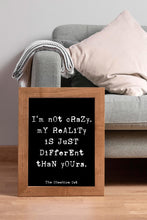 Load image into Gallery viewer, Cheshire Cat Quote Print – “I’m Not Crazy” Wall Art, Alice in Wonderland Decor, Book Nook Decor, Black and White Book Shelf Decor, Book Nook