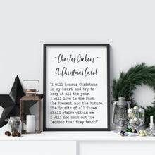 Load image into Gallery viewer, May include: A black and white printable quote from Charles Dickens' A Christmas Carol. The quote reads 'I will honour Christmas in my heart, and try to keep it all the year. I will live in the Past, the Present, and the Future. The Spirits of all Three shall strive within me. I will not shut out the lessons that they teach!'