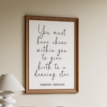 Load image into Gallery viewer, Nietzsche quote print with “You must have chaos within you” in minimalist black script wall art
