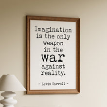 Load image into Gallery viewer, Imagination is the only weapon in the war against reality quote in black typewriter lettering on a white background in a wooden frame