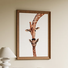 Load image into Gallery viewer, Watercolour print of a mother giraffe nuzzling her baby, framed for nursery wall art