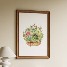 Load image into Gallery viewer, Watercolour painting of potted succulents in green and pink with a yellow cactus flower and rope bow on a white background in a wooden frame