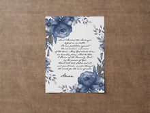 Load image into Gallery viewer, Saint Michael the Archangel prayer print on a white background with a cursive font in a handwritten style and dark blue watercolor flowers surrounding the text. The print is displayed without a frame in this photo.