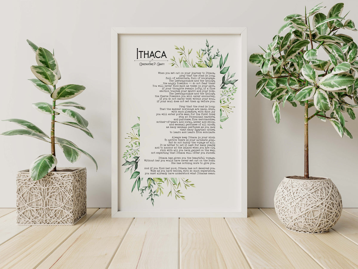 Ithaca poem print by Constantine Peter Cavafy with a tasteful greenery border in watercolor style. Pictured in a white frame (not included) between two houseplants