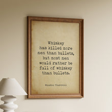 Load image into Gallery viewer, Framed quote print "whiskey has killed more men than bullets" attributed to Winston Churchill on vintage paper style background
