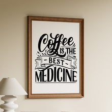 Load image into Gallery viewer, Coffee is the best medicine in black vintage hand lettering with a ribbon banner on a white background in a wooden frame

