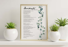 Load image into Gallery viewer, May include: A framed print with a gold frame. The print has a white background with a vertical line of green watercolor leaves. The text on the print reads 'Desiderata' and 'Max Ehrmann' and includes a poem about living a good life.
