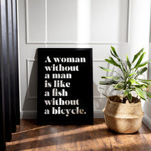 Load image into Gallery viewer, Feminist Wall Art "A woman without a man is like a fish without a bicycle.”
