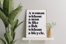 Load image into Gallery viewer, Feminist Wall Art "A woman without a man is like a fish without a bicycle.”
