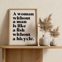 Load image into Gallery viewer, Feminist Wall Art "A woman without a man is like a fish without a bicycle.”
