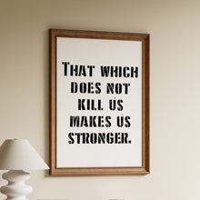 Load image into Gallery viewer, Nietzsche quote print reading “That which does not kill us makes us stronger” in bold distressed black typography

