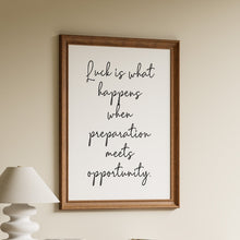 Load image into Gallery viewer, Luck is what happens when preparation meets opportunity, Seneca quote in black flowing script on a white background in a wooden frame
